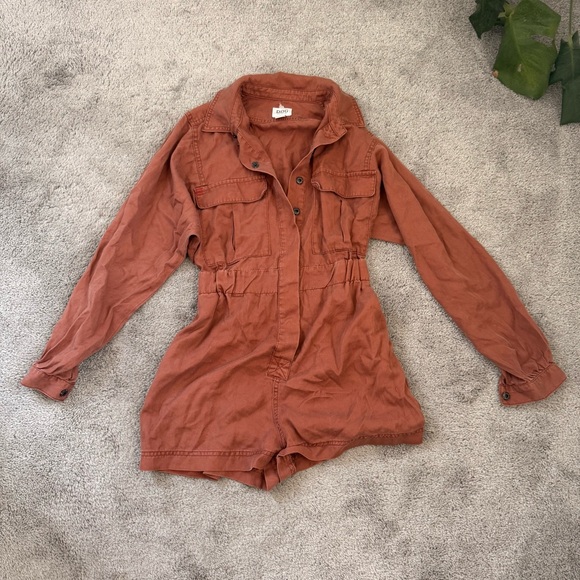 RUST ORANGE BDG LONG SLEEVE UTILITY ROMPER - Picture 1 of 3